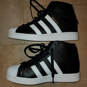 Womens Adidas superstar hidden wedge sneakers.